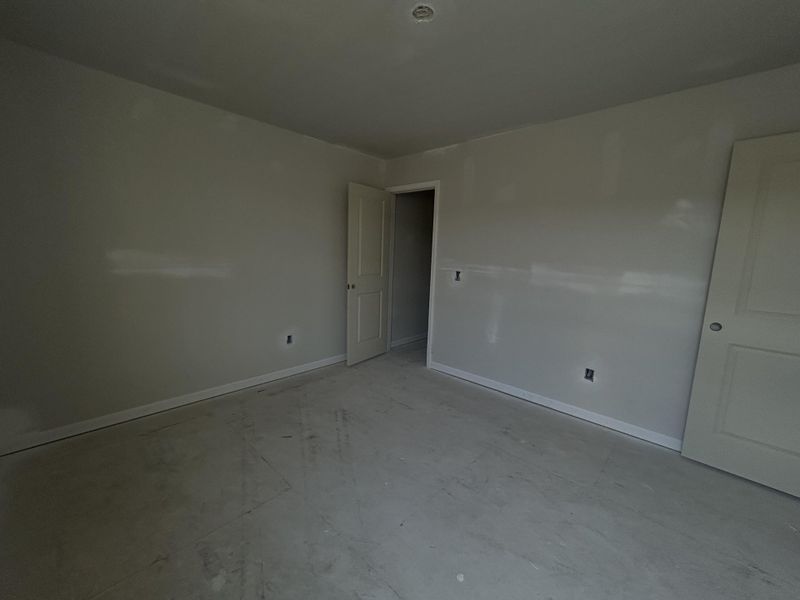 In-progress construction of a new home in Tea Farm: Lake Series, Ravenel, SC (Image 22).