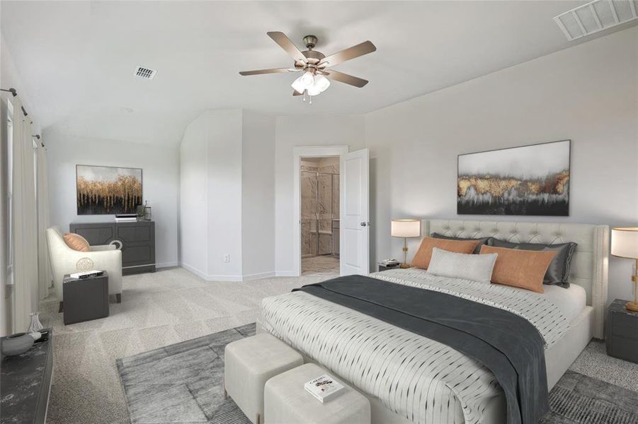 Bedroom with ceiling fan, ensuite bath, and light colored carpet