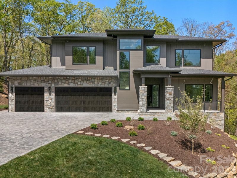 Front exterior of a new home in , Horse Shoe, NC, highlighting curb appeal (Image 12).