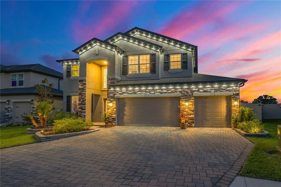 Front exterior of a new home in , Wesley Chapel, FL, highlighting curb appeal (Image 27).