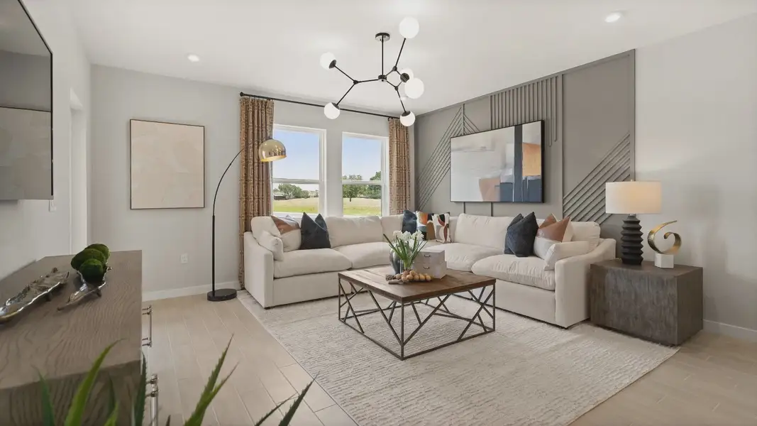 Spacious Living Room of a new construction DRB Homes Jupiter Model at Grasslands West in Lakeland, FL.