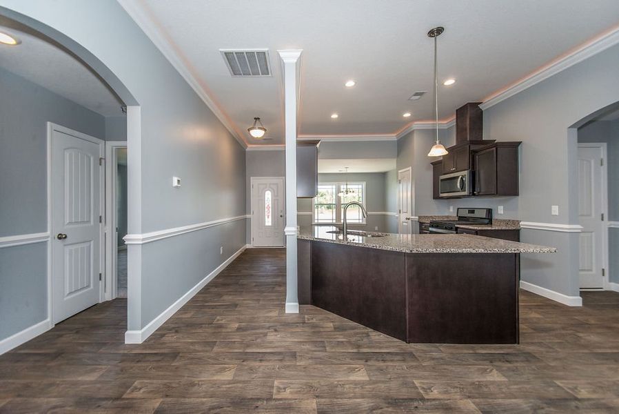 Representative furnished interior of a home built from the Jackson by Enchanted Homes in Lonesome Dove, San Antonio (Image 14).