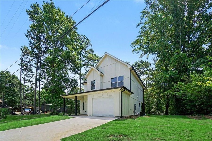 Front exterior of a new home in , Gainesville, GA, highlighting curb appeal (Image 18).