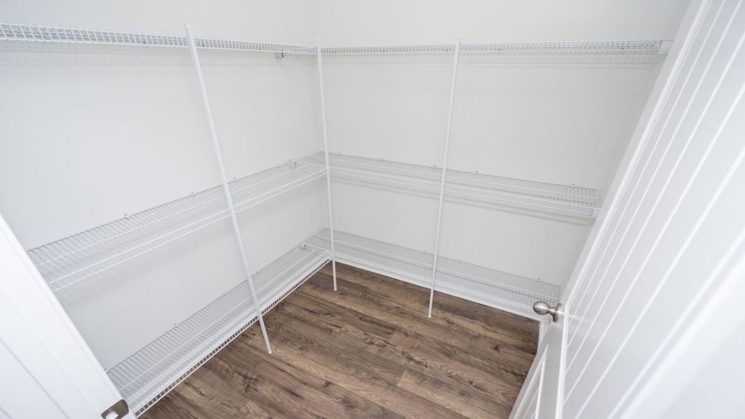 Representative unfurnished interior of a home built from the ROBIE by D.R. Horton in Indigo Preserve, Leland (Image 17).