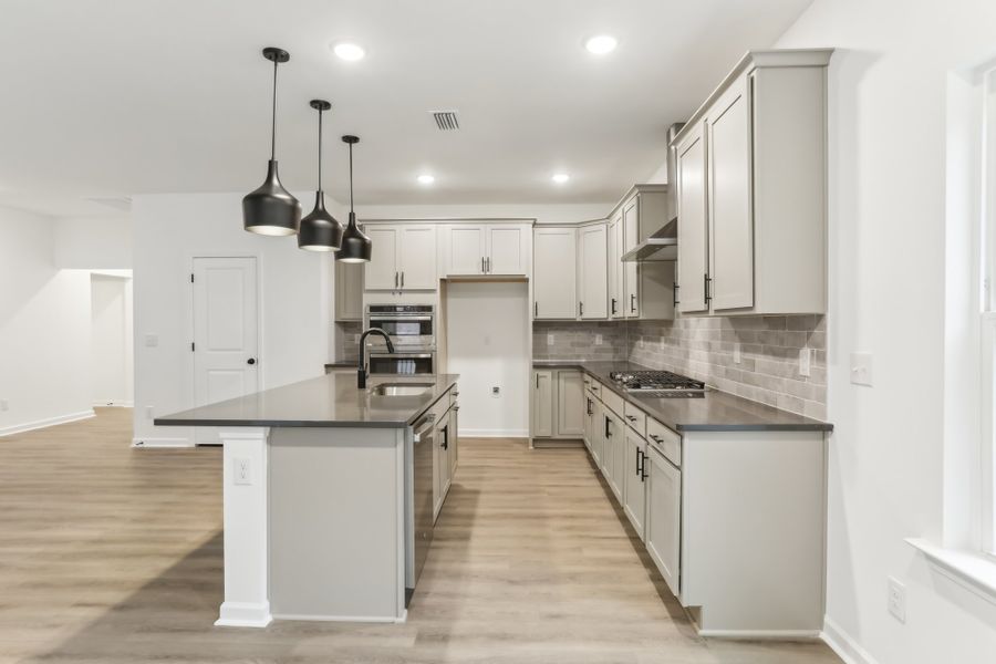 Furnished interior in a model home at Rowland's Grant in Fuquay Varina (Image 15).