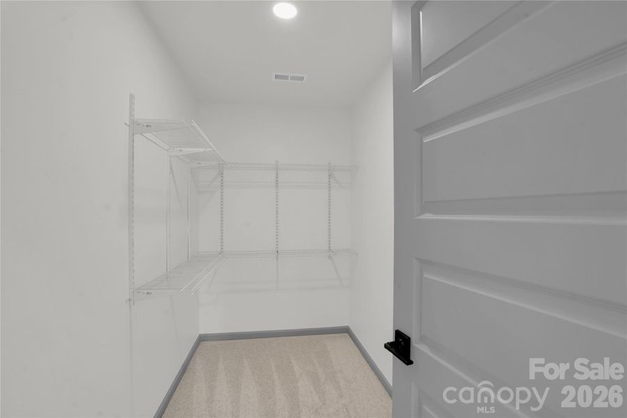 Primary Walk in closet Primary Walk in closet