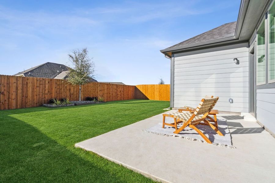 Covered Patio in the Willow home plan by Trophy Signature Homes