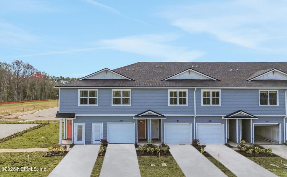 Front exterior of a new home in , Jacksonville, FL, highlighting curb appeal (Image 26).