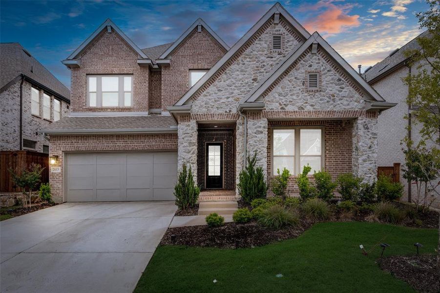 Front exterior of a new home in Mustang Lakes, Celina, TX, highlighting curb appeal (Image 25).