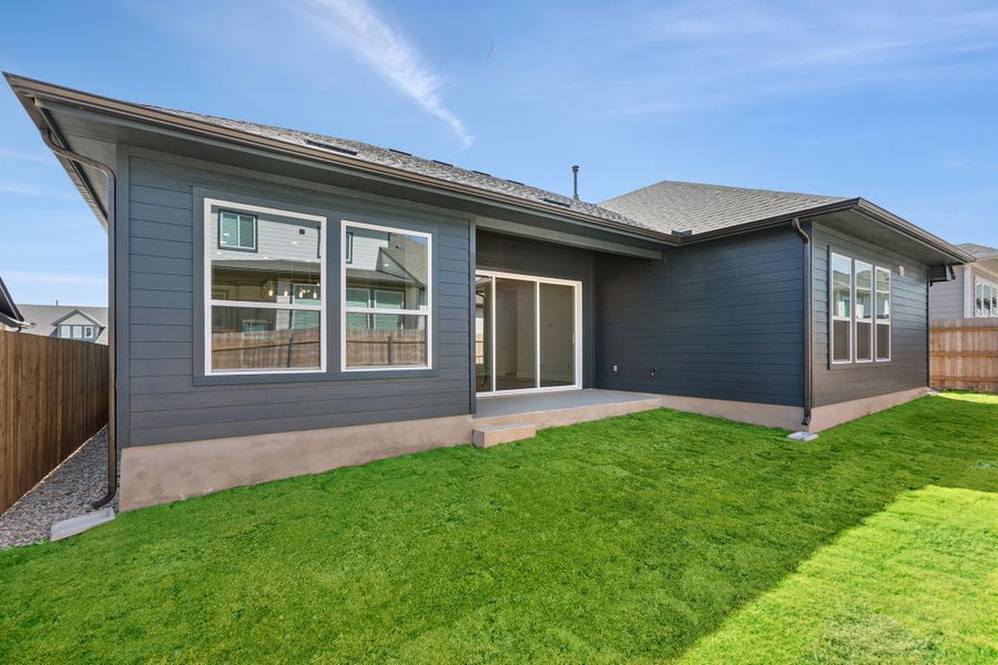 Exterior details and patio area of a home in Sunfield, Buda (Image 3).