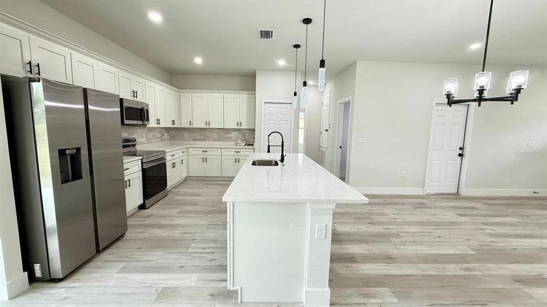 Furnished interior view inside a new home in , Ocala (Image 6). Furnished interior view inside a new home in , Ocala (Image 6).