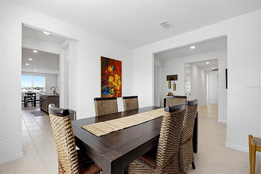 Furnished interior view inside a new home in The Grove at Stuart Crossing - Signature Series, Bartow (Image 7). Furnished interior view inside a new home in The Grove at Stuart Crossing - Signature Series, Bartow (Image 7).