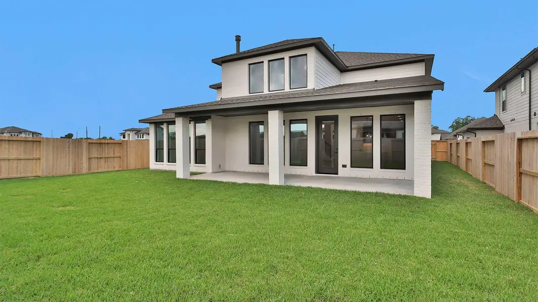 Exterior details and patio area of a home in Sienna, Missouri City (Image 4). Exterior details and patio area of a home in Sienna, Missouri City (Image 4).