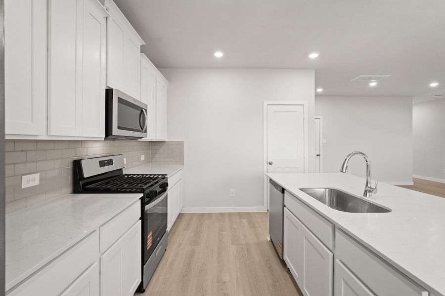 Furnished interior view inside a new home in Lakes at Black Oak, Magnolia (Image 11).