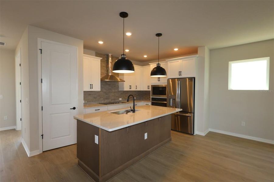 Furnished interior view inside a new home in Weslyn Park in Sunbridge 34', St. Cloud (Image 5).