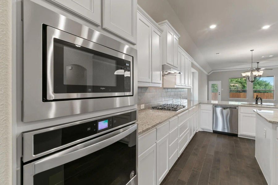 Kitchen | Concept 2533 at Mockingbird Hills in Joshua, TX by Landsea Homes