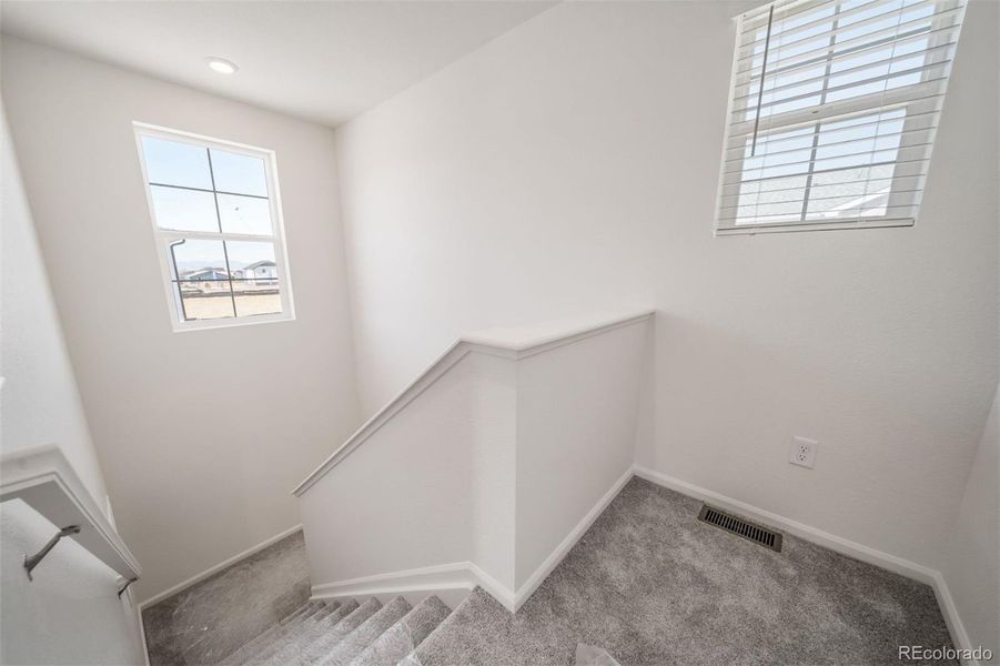 Spacious, unfurnished interior of a new home in Reunion, Commerce City (Image 19).