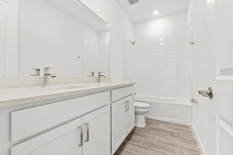 Furnished interior view inside a new home in Tesoro Club, Port St. Lucie (Image 8).