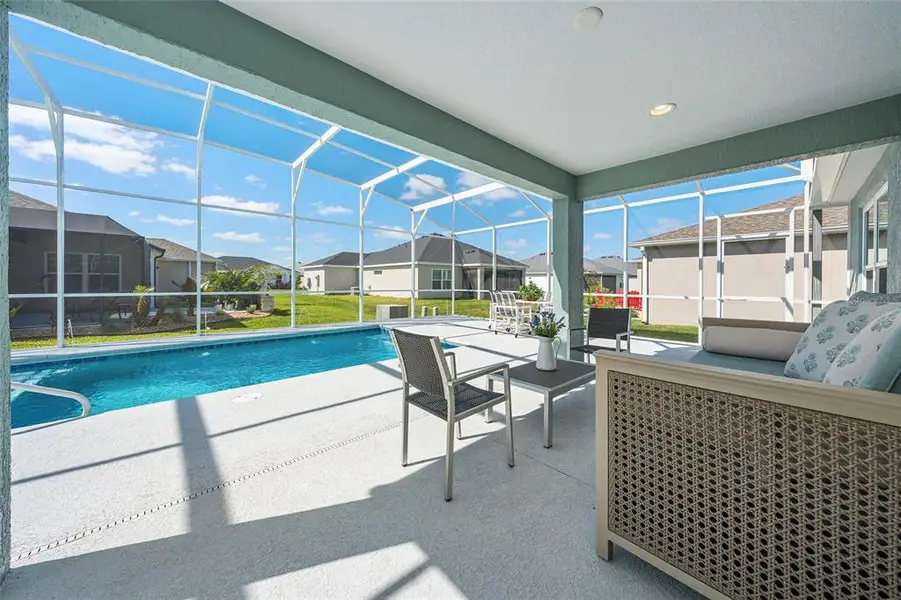 Exterior details and patio area of a home in , The Villages (Image 30).