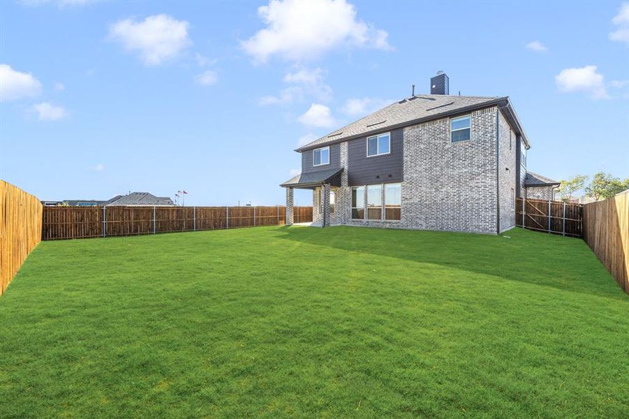 Exterior details and patio area of a home in Meadow Vista 60-65, Anna (Image 3). Exterior details and patio area of a home in Meadow Vista 60-65, Anna (Image 3).