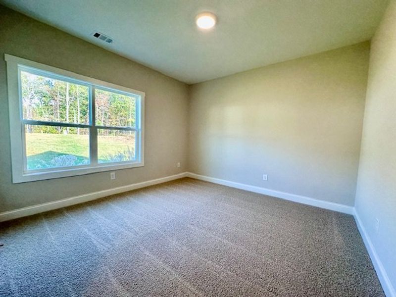 Spacious, unfurnished interior of a new home in Deer Creek, Moreland (Image 10).