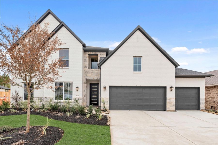 Front exterior of a new home in Kresston - 65', Montgomery, TX, highlighting curb appeal (Image 2).