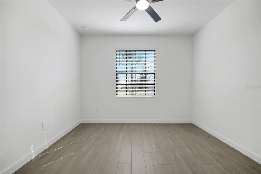 Spacious, unfurnished interior of a new home in Verdana Village, Estero (Image 18).