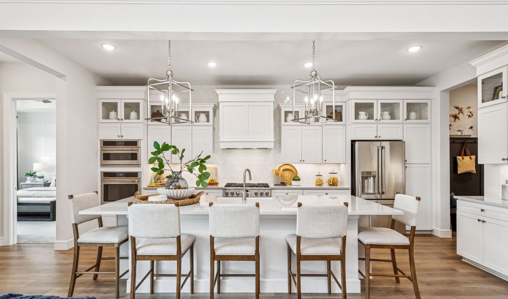 Kitchen with vast island & pendant lights Kitchen with vast island & pendant lights