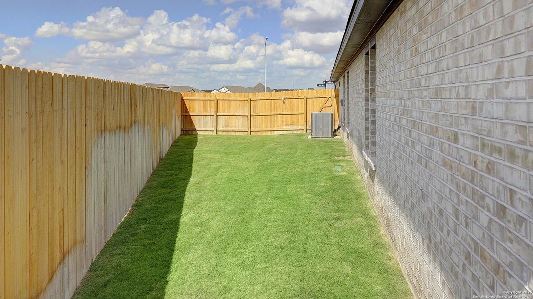 Exterior details and patio area of a home in Alsatian Oaks 50', Castroville (Image 16). Exterior details and patio area of a home in Alsatian Oaks 50', Castroville (Image 16).