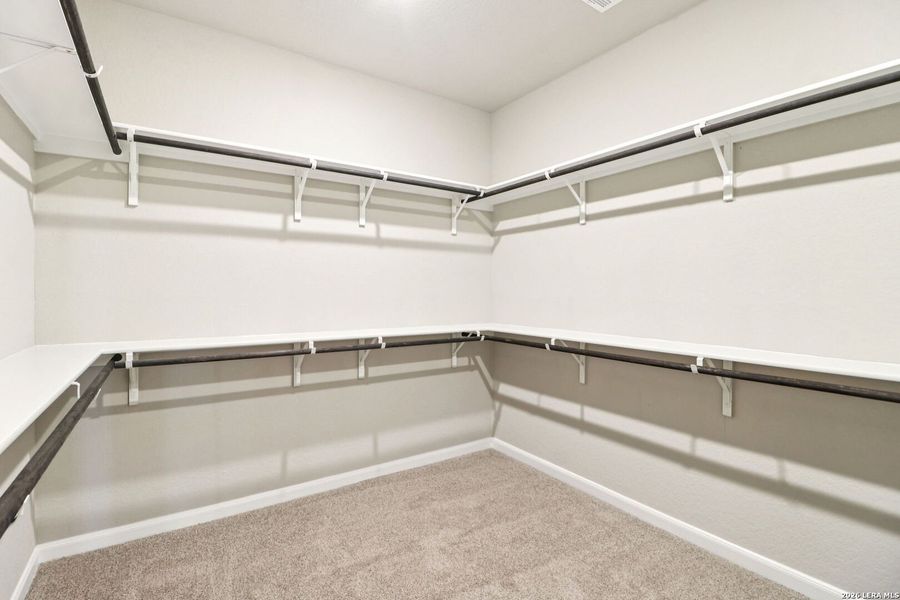 Spacious, unfurnished interior of a new home in Estancia Ranch - Classic Series, San Antonio (Image 41).