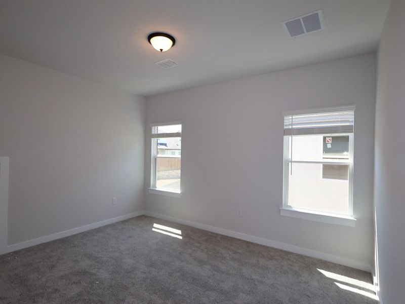 Spacious, unfurnished interior of a new home in Cedar Brook, Leander (Image 36).