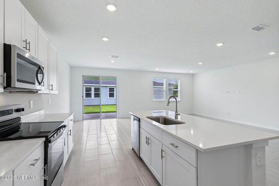 Furnished interior view inside a new home in Flagler Village - Signature Series, Palm Coast (Image 8).