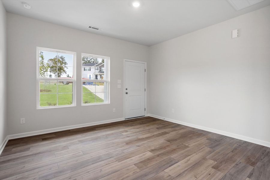 Spacious, unfurnished interior of a new home in Cambridge Reserve, Angier (Image 17).
