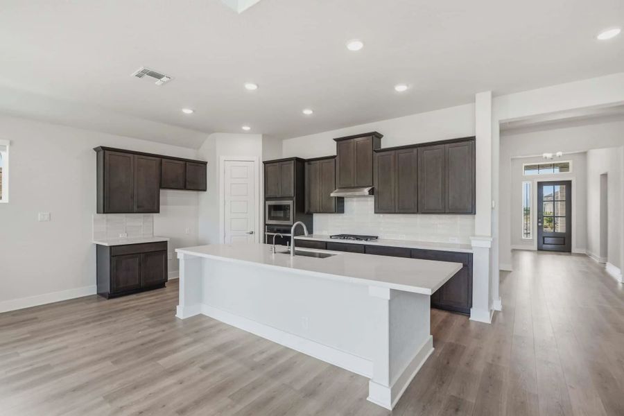 Representative furnished interior of a home built from the Mackenzie by Chesmar Homes in Esperanza 60's, Boerne (Image 8).