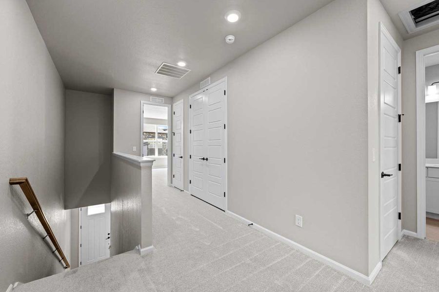 Spacious, unfurnished interior of a new home in Ralston Creek, Arvada (Image 18).