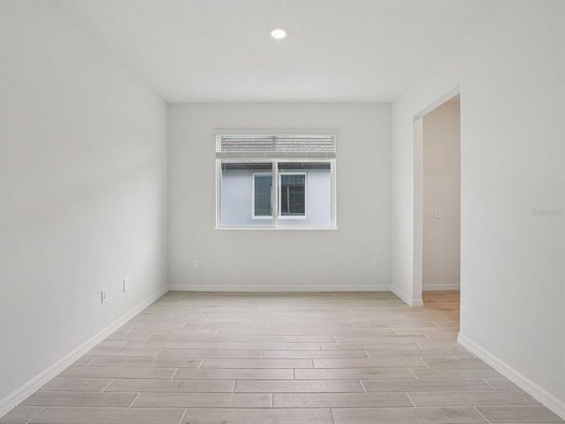 Spacious, unfurnished interior of a new home in Oakfield Trails - Signature Series, Parrish (Image 7).