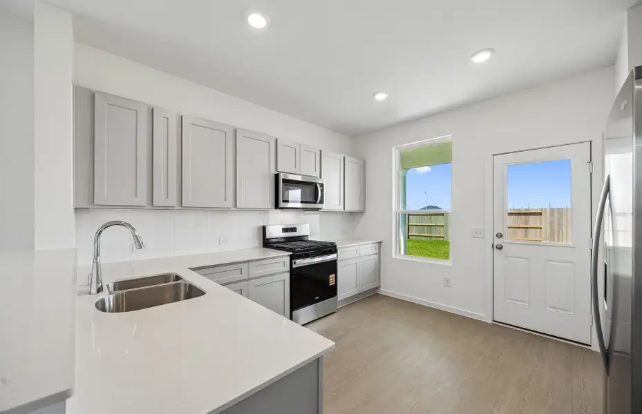 Furnished interior view inside a new home in Windcress, Cove (Image 17).