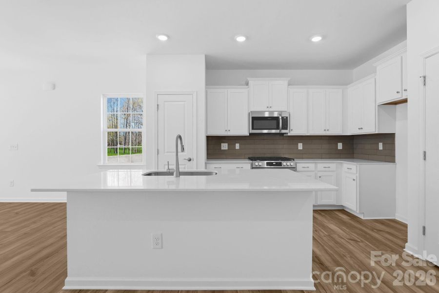 Furnished interior view inside a new home in Cannon Village, York (Image 3).