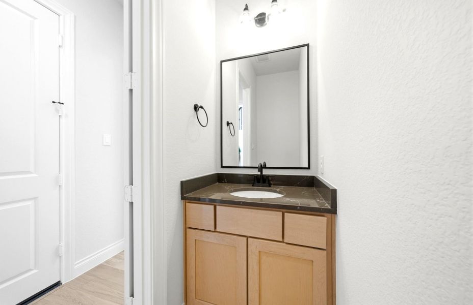 Furnished interior view inside a new home in Bridgeland 50', Cypress (Image 5).