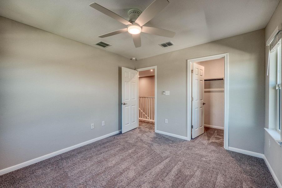 Soft carpeting pairs with neutral walls to create a restful, welcoming atmosphere. Soft carpeting pairs with neutral walls to create a restful, welcoming atmosphere.