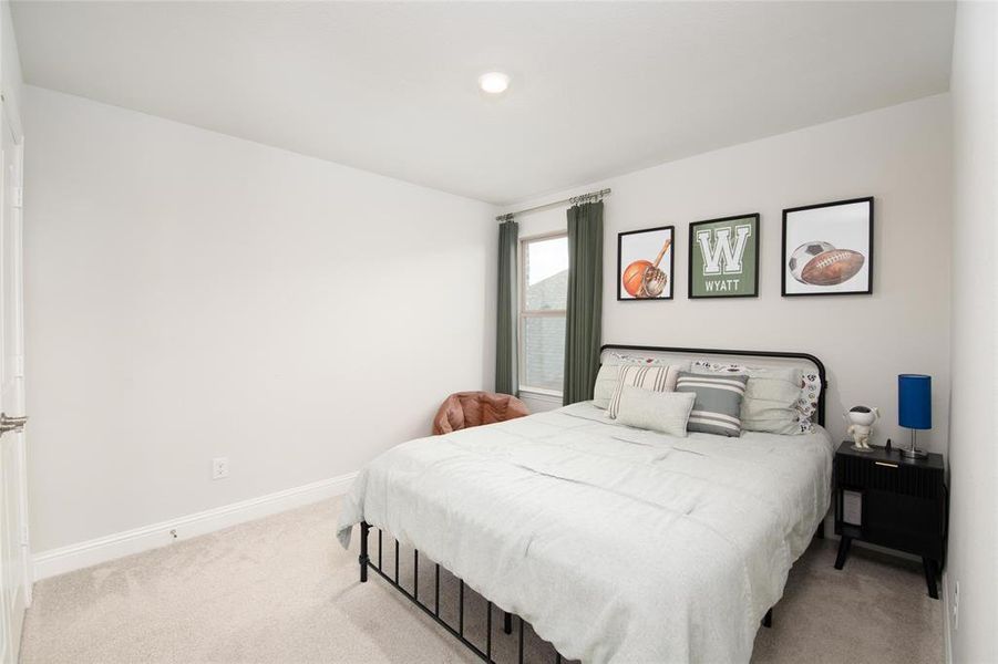 Another spacious secondary bedroom provides flexibility for family, guests, a study area, or creative space, ensuring room for everyone to spread out and enjoy. Another spacious secondary bedroom provides flexibility for family, guests, a study area, or creative space, ensuring room for everyone to spread out and enjoy.
