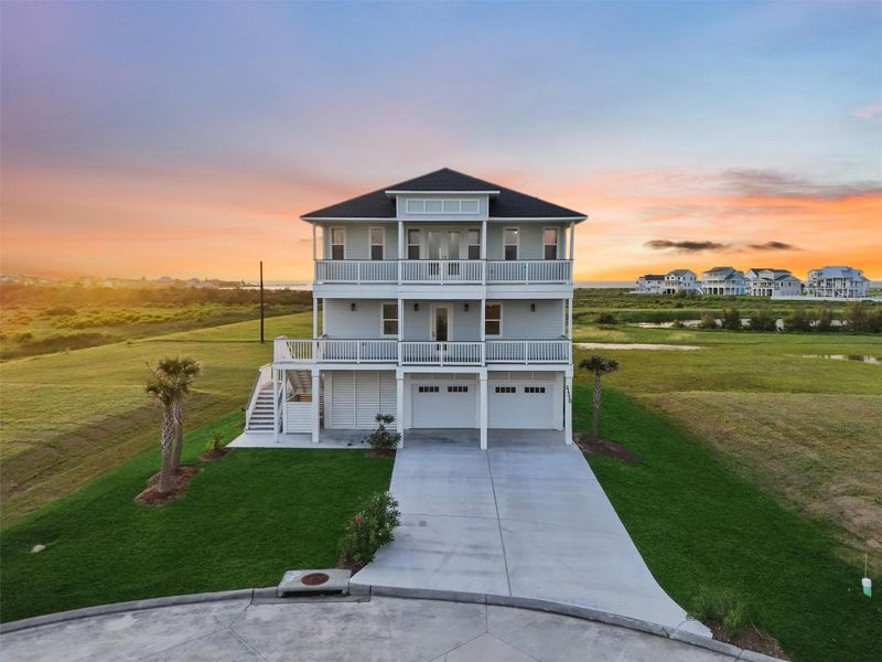 Front exterior of a new home in , Galveston, TX, highlighting curb appeal (Image 1). Front exterior of a new home in , Galveston, TX, highlighting curb appeal (Image 1).