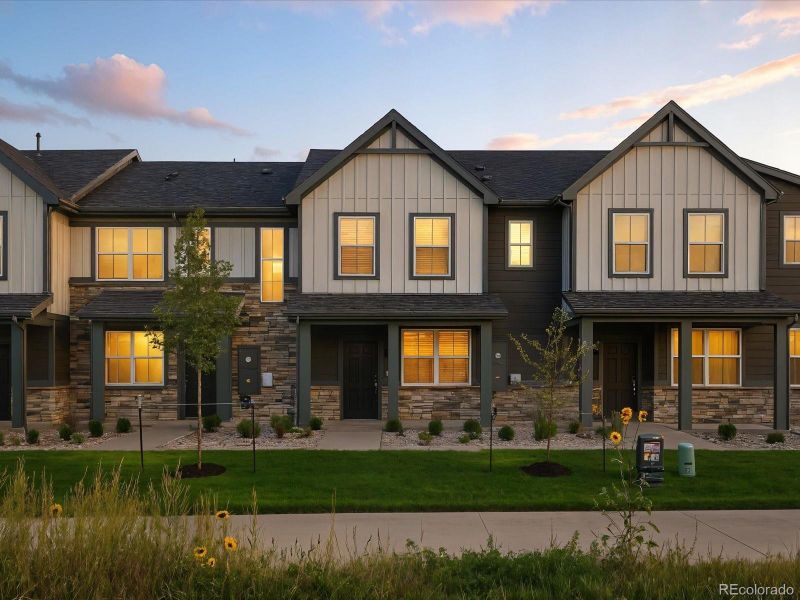 Front exterior of a new home in Poudre Heights: The Meadow Collection, Windsor, CO, highlighting curb appeal (Image 2). Front exterior of a new home in Poudre Heights: The Meadow Collection, Windsor, CO, highlighting curb appeal (Image 2).