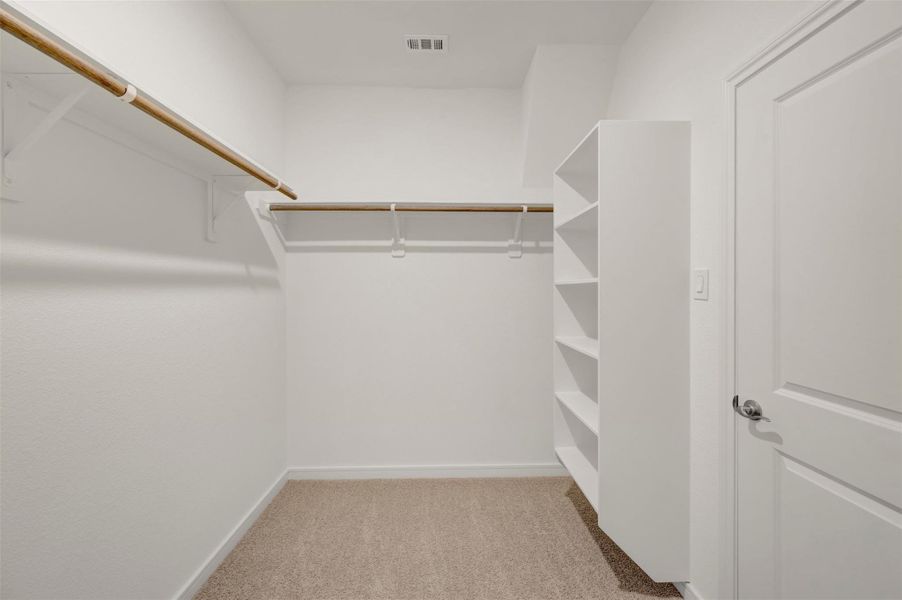 Primary walk-in closet