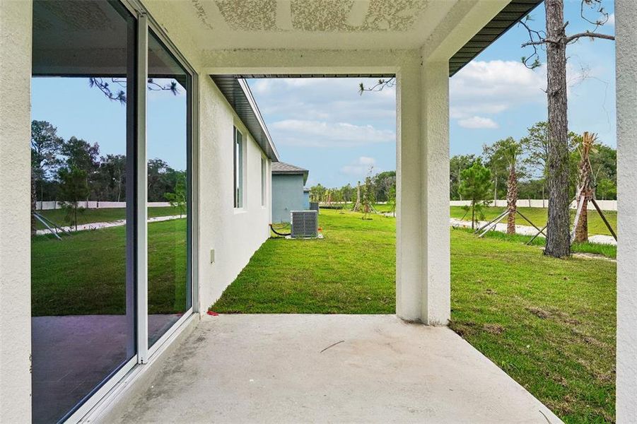 Exterior details and patio area of a home in Pine Ridge Meadows, Hudson (Image 29).