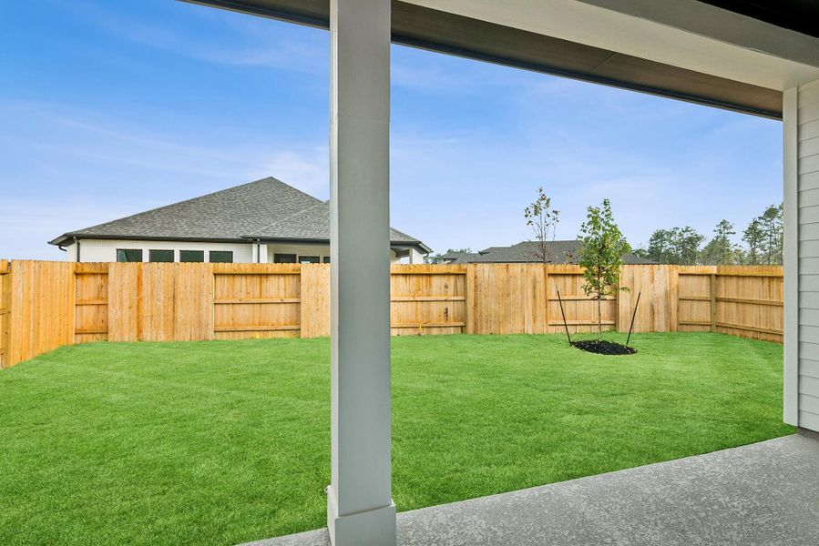 Exterior details and patio area of a home in ARTAVIA 50' Homesites, Conroe (Image 27).