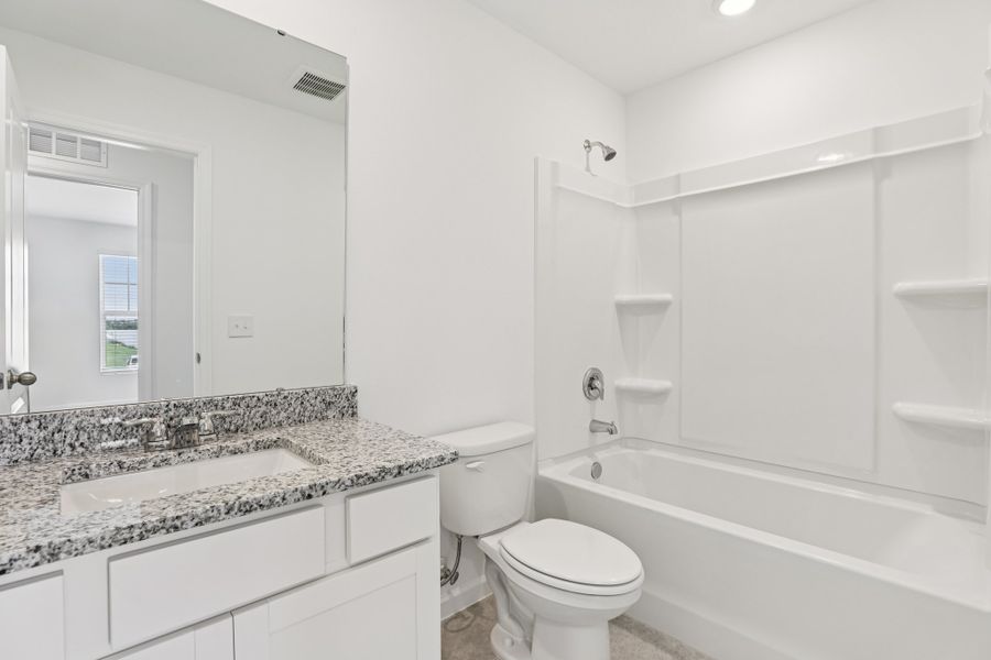 Representative furnished interior of a home built from the Pulsar by Starlight Homes in Aster Towns, Summerville (Image 14).