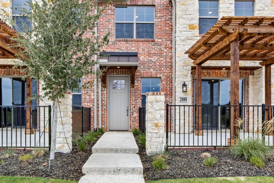 Exterior details and patio area of a home in The Tribute, The Colony (Image 3). Exterior details and patio area of a home in The Tribute, The Colony (Image 3).