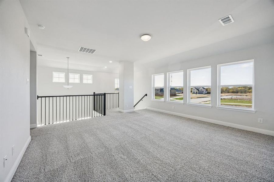 Spacious, unfurnished interior of a new home in Santorini, Seagoville (Image 13).