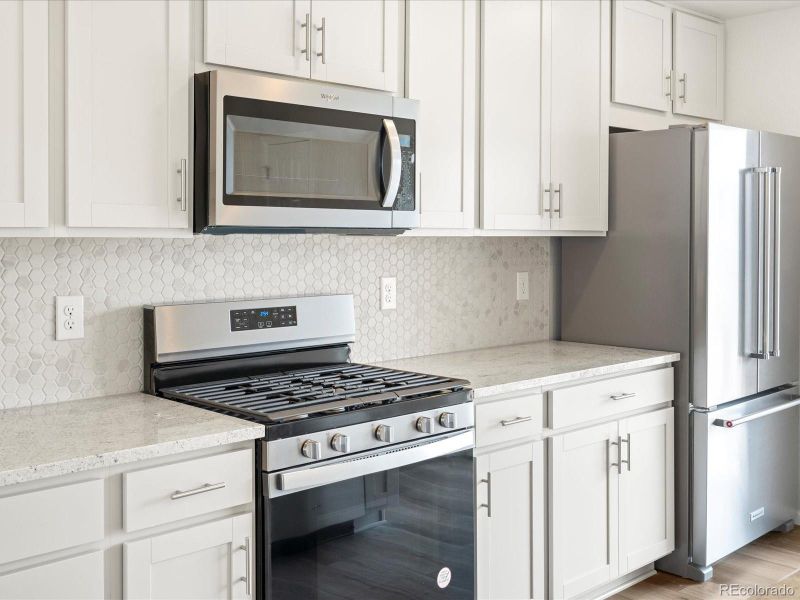 Furnished interior view inside a new home in Three Hills, Morrison (Image 14).
